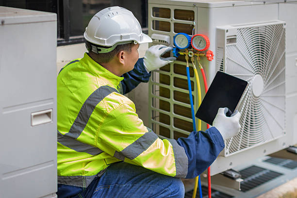 Professional Heat Pump Repair technician working in Hecker, IL